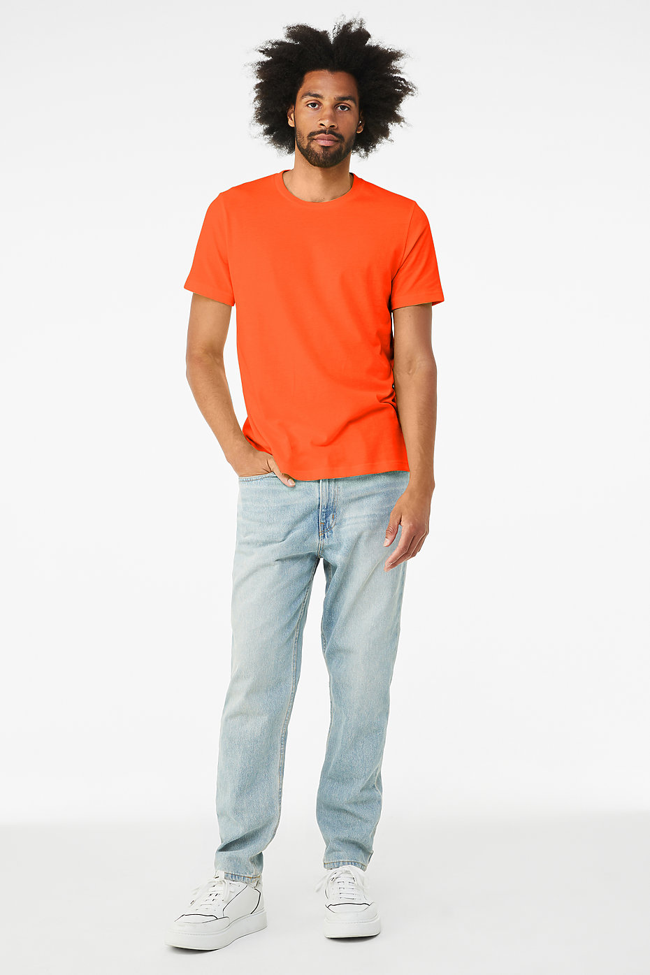 full body front view of a man in an orange t shirt
